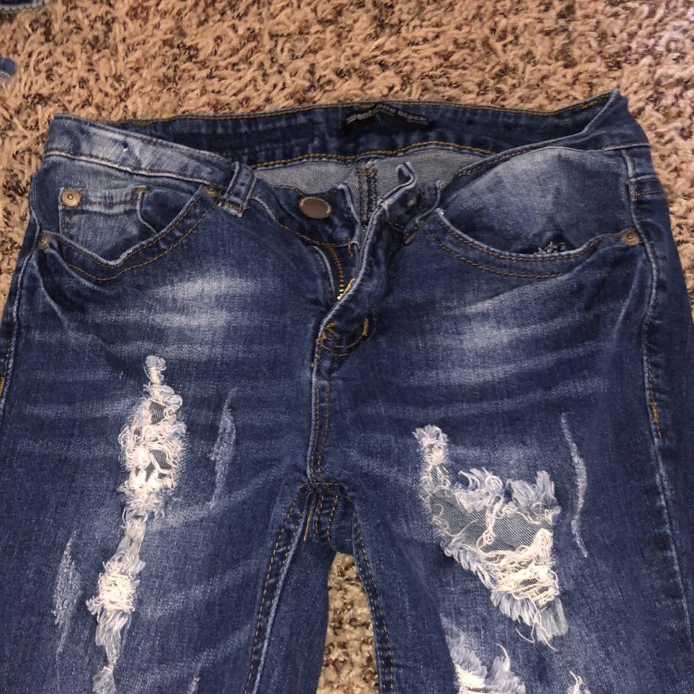 Twenty one black RUE 21 RIPPED JEANS